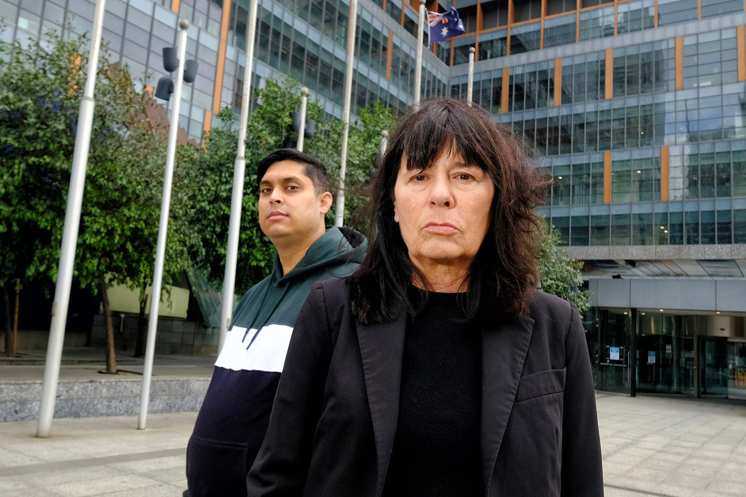 Uber drivers Syed Mubashir and Debra Weddall outside the Federal Court in Melbourne. Credit: Luis Enrique Ascui